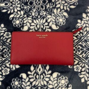 WELL LOVED Kate Spade Large Slim Bifold Wallet in Dark Red - Used Condition